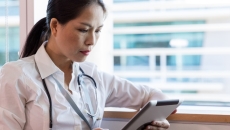 A doctor with a tablet