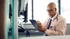 A doctor using an EHR