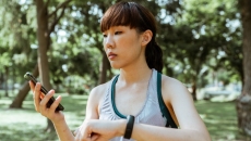 A person with a fitness tracking watch