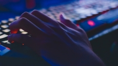 A hand on a keyboard