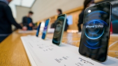 An iPhone 12 pro in an Apple store