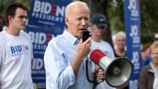 Joe Biden at a campaign rally with a megaphone
