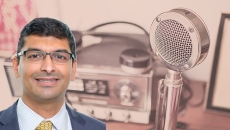 Dr. Maulik Majmudar's headshot on a background with a mic