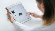 A doctor using an iPad