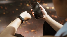 A person looking at their smart watch