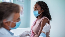 A patient getting vaccinated