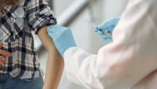 Person being vaccinated.