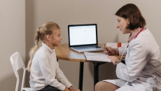A young patient in consultation with a doctor