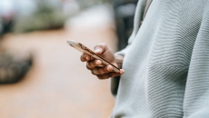 Person holds smartphone
