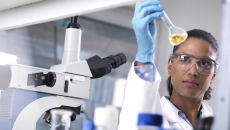 lab worker holding a test tube