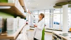 Pharmacist filling order in pharmacy