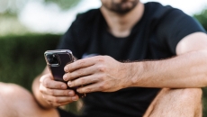 A person holding an iPhone