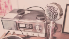 An old-fashioned radio and microphone