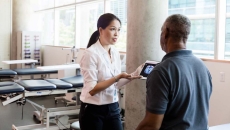 Client and worker at physical therapy center