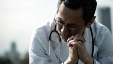 Sad doctor Photo by RUNSTUDIO/Getty Images