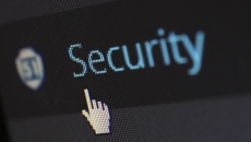 A cursor hovering over a "security" text on a screen