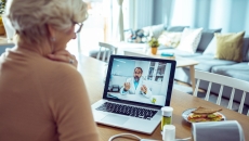 A telehealth visit via laptop