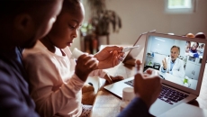 Telehealth appointment with parent and child