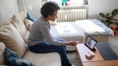 A telehealth consultation via laptop
