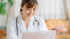 A doctor using telehealth