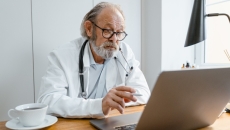 A doctor performing a telehealth consultation
