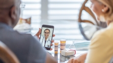 Two patients in a telehealth consultation