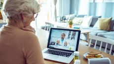 A patient looking at a computer