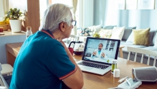 A patient speaks with a doctor via telehealth