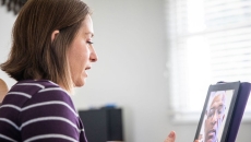 Patient using tablet for telehealth