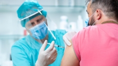 A patient receives a vaccine