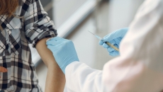 A person getting the COVID-19 shot