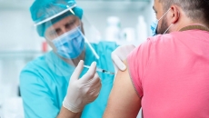 A vaccine shot being administered.