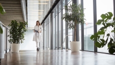 A doctor walking down a hallway