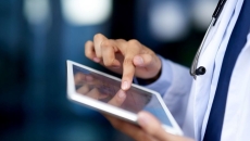 doctor using a tablet