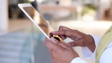 A doctor using a digital tablet
