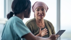 A cancer patient consulting with their doctor