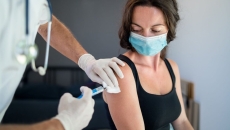 A person getting their COVID-19 vaccine shot