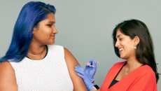 A patient receiving a vaccine