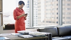 Office worker using smartphone