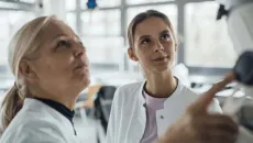 Healthcare workers looking upwards