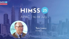 Tom Leary, HIMSS_Kuala Lumpur City Skyline, Malaysia Photo by Deejpilot/E+/Getty Images