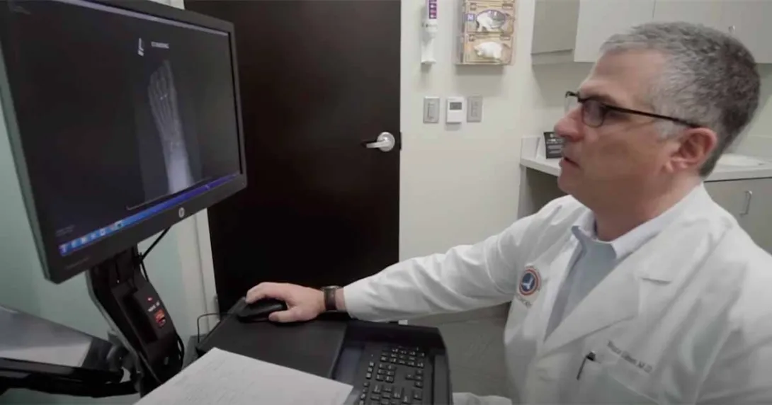 Health professional at desktop computer Health professional at desktop computer