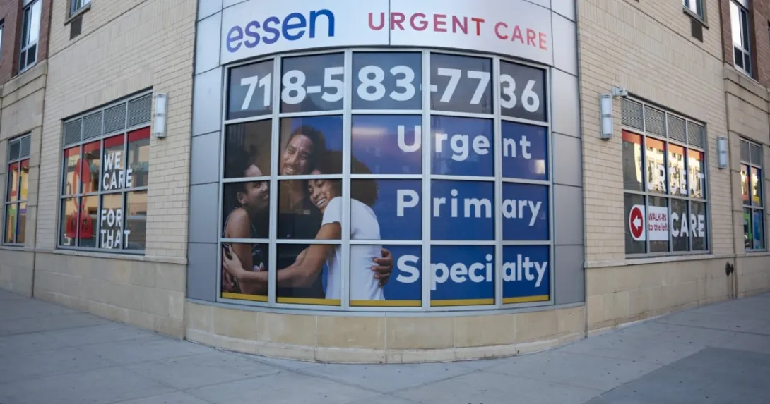 Essen Urgent Care sign on curved building