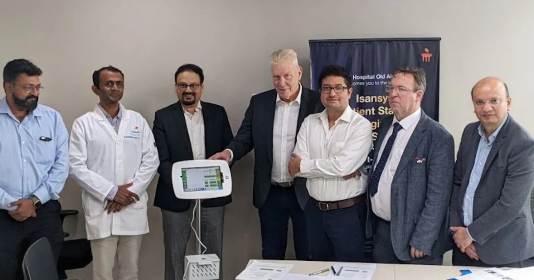 Officials from Manipal Hospitals and Isansys Lifecare pose during the signing of a partnership to adopt the Patient Status Engine