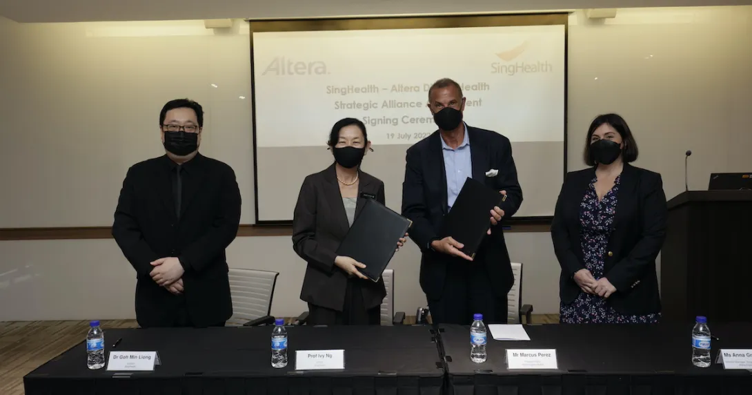 Officials from SingHealth and Altera Digital Health pose during the signing of a new partnership deal