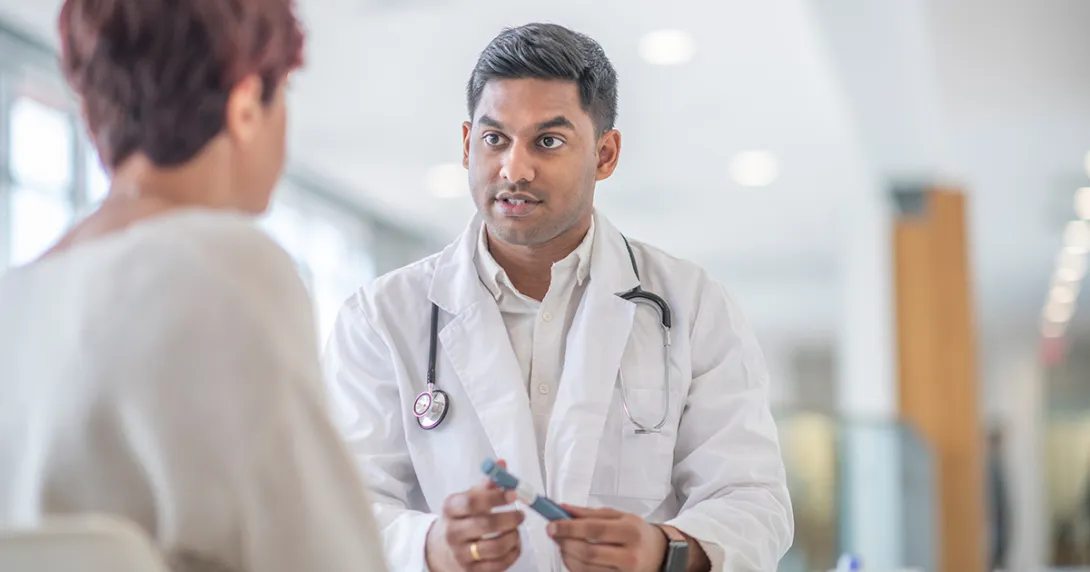 Doctor talking to patient