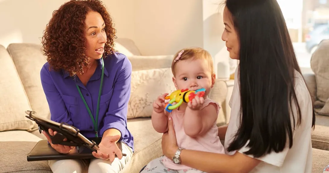 Parent and child talking to provider