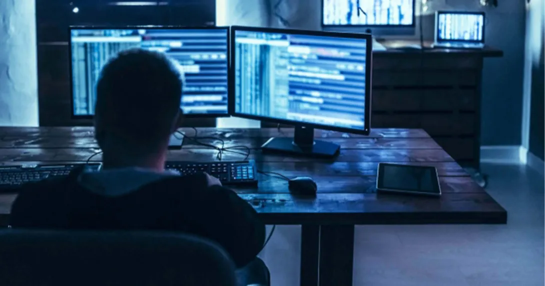 Dark monitors on a desk and more on a dresser Dark monitors on a desk and more on a dresser
