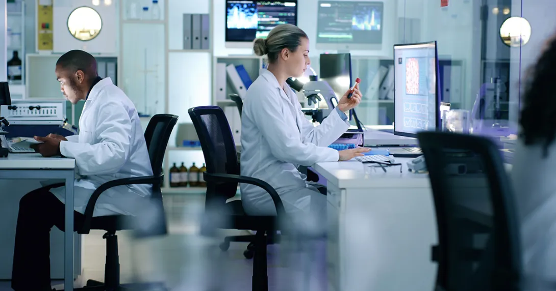 Doctors working in a lab Doctors working in a lab