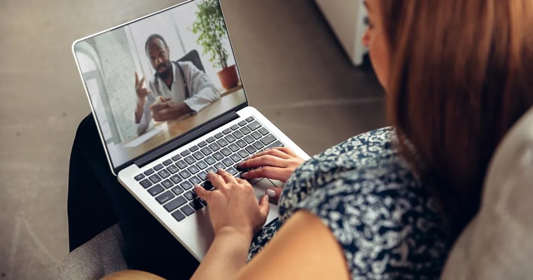 A telehealth visit via laptop